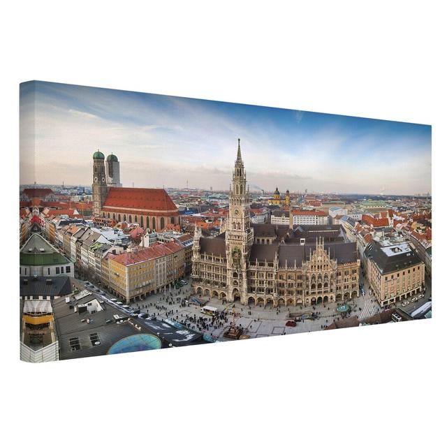 Leinwandbild Stadt München 17 Stories Größe: 40cm H x 80cm B on Productcaster.