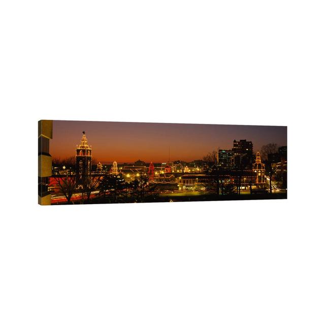 Buildings Lit up at Night, La Giralda, Kansas City, Missouri, USA - Wrapped Canvas Panoramic Graphic Art Ebern Designs Size: 30.48cm H x 91.44cm W x 1 on Productcaster.