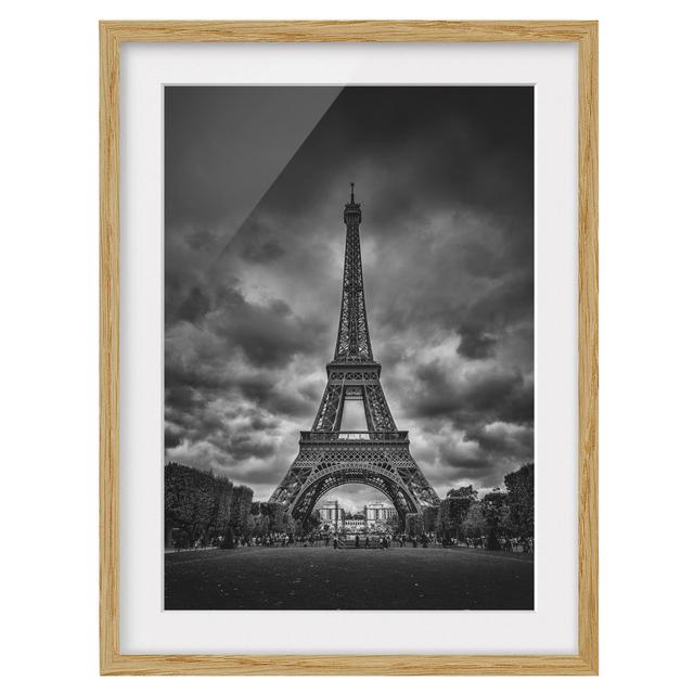 Eiffel Tower in Front of Clouds Black and White - Picture Frame Photograph Ebern Designs Frame Option: Brown Framed, Size: 100cm H x 70cm W x 2cm D on Productcaster.