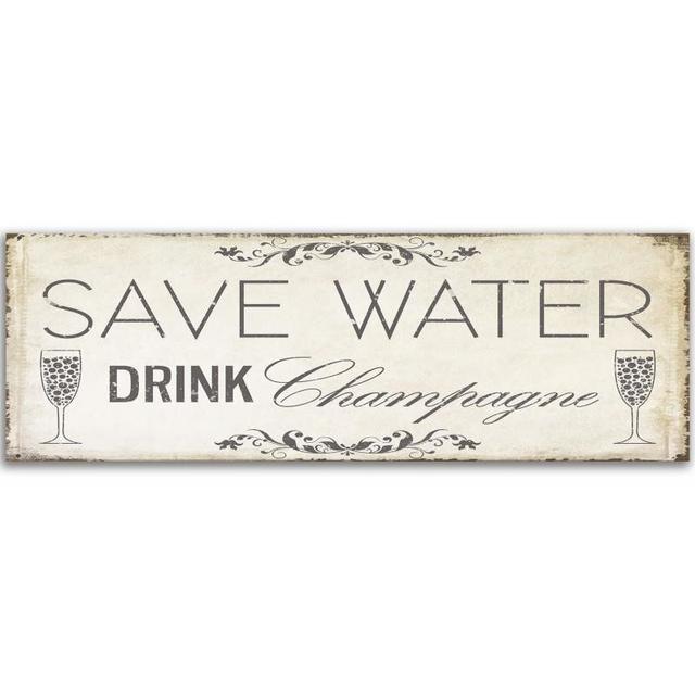 Leinwandbild Save Water Drink Champagne Happy Larry Größe: 40 cm x 100 cm on Productcaster.