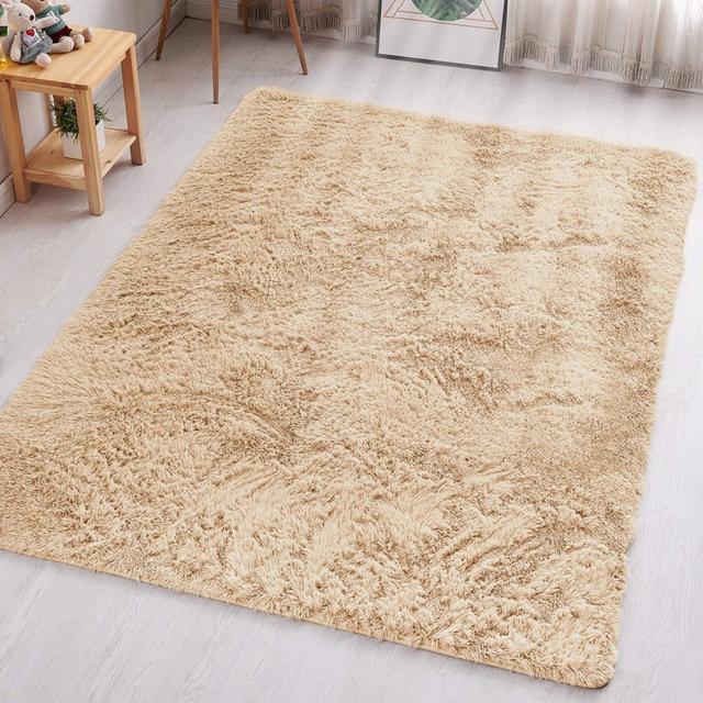 Irin Indoor/Outdoor Beige Fluffy Area Rug 17 Stories Rug Size: Rectangle 80 x 150cm on Productcaster.