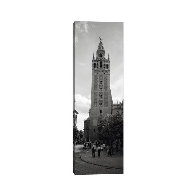 Group Of People Walking Near A Church - Wrapped Canvas Panoramic Print Ebern Designs Size: 60cm H x 20cm W x 2cm D on Productcaster.