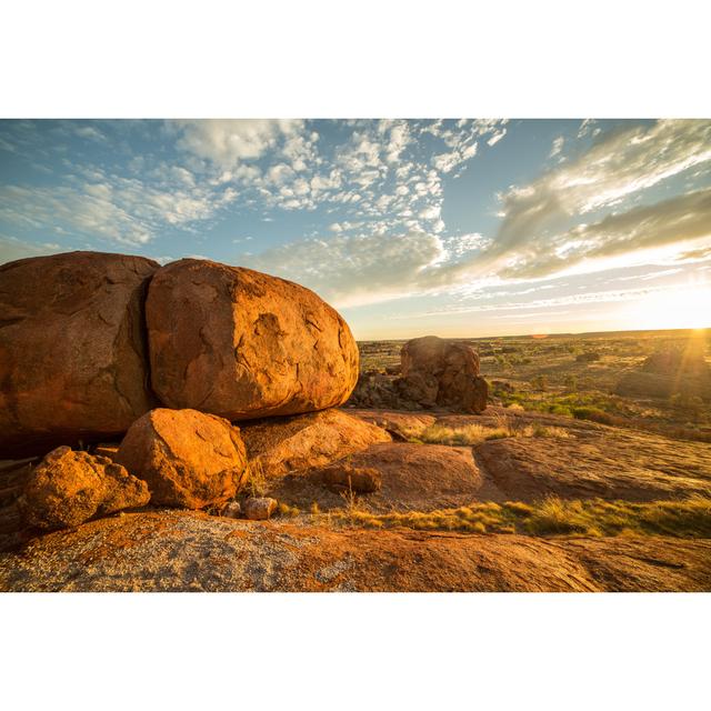 Devil's Marbles At Sunrise by Swissmediavision - Print Natur Pur Size: 80cm H x 120cm W on Productcaster.