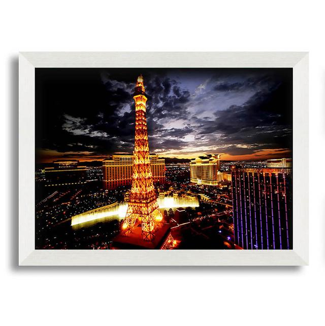 Paris Eiffel Tower Golden Night Glow - Single Picture Frame Art Prints Ebern Designs Size: 59.7cm H x 84.1cm W x 10cm D, Fomat: White Framed Paper on Productcaster.