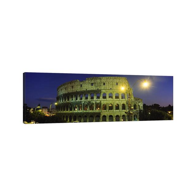 Ancient Building Lit Up At Night, Coliseum, Rome, Italy - Wrapped Canvas Panoramic Print Ebern Designs Size: 50.8cm H x 152.4cm W x 1.91cm D on Productcaster.