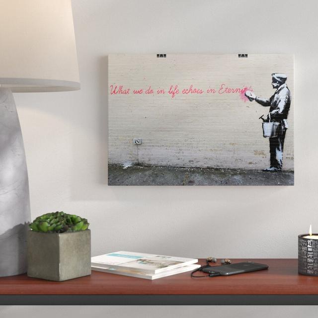 What We Do in Life Graffti Wall Art by Banksy - Photographic Print on Paper East Urban Home Size: 59.4 x 84.1cm on Productcaster.