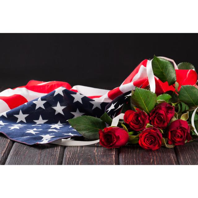 Rose and American Flag - Wrapped Canvas Photograph Ebern Designs Size: 81cm H x 122cm W x 3.8cm D on Productcaster.