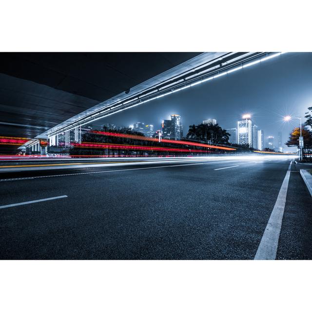 The Light Trails on the Modern Building Background by Hallojulie - Wrapped Canvas Photograph 17 Stories Size: 61cm H x 91cm W on Productcaster.