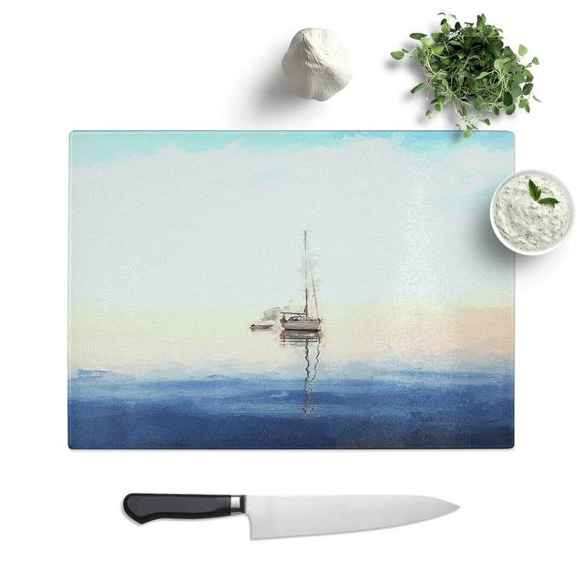 Glass Lone Sailboat in Abstract Chopping Board East Urban Home Size: 39 cm W x 28.5 cm L on Productcaster.