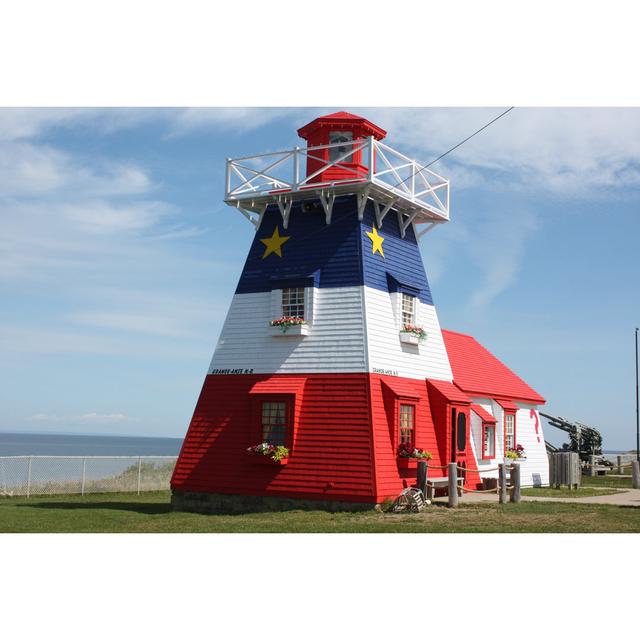 Grand-Anse Lighthouse by Artiste9999 - Wrapped Canvas Photograph Breakwater Bay Size: 61cm H x 91cm W on Productcaster.