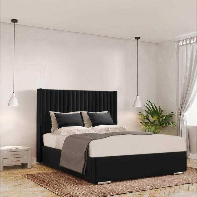 Chanteria Upholstered Bed Frame Ivy Bronx Size: 150 x 200 cm, Colour: Black on Productcaster.