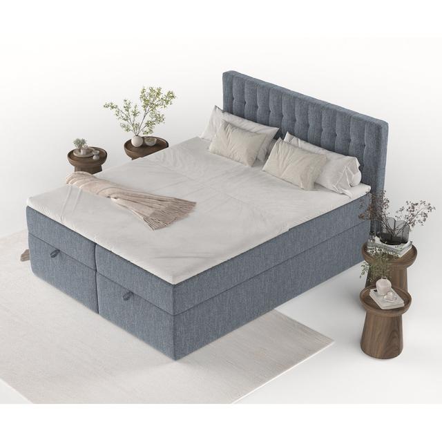 Boxspringbett Ampio mit Bettkasten und Topper Maison de Rêve Farbe: Blau on Productcaster.