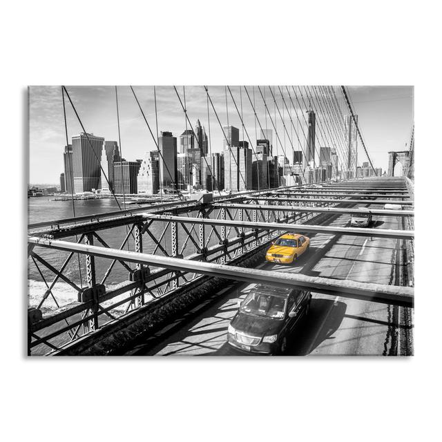 Ungerahmtes Foto auf Glas "Yellow Taxi in New York on Bridge" Brayden Studio Größe: 70 cm H x 100 cm B x 0,4 cm T on Productcaster.