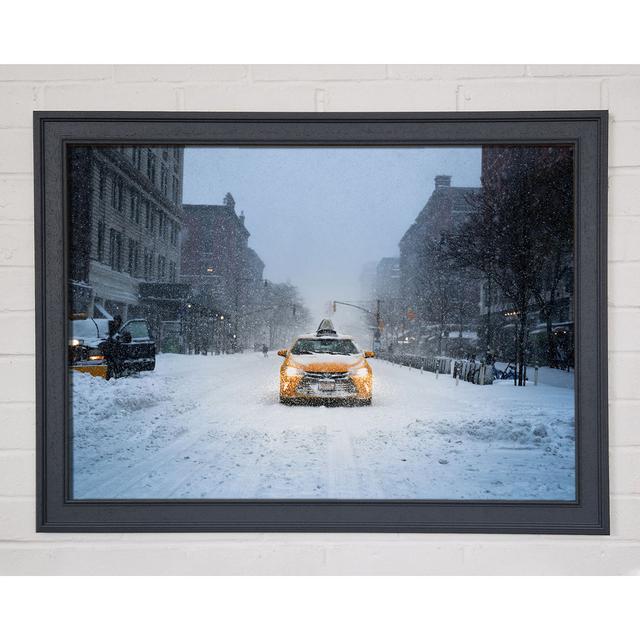 Yellow Cab In The Snow - Print Latitude Run Format: Matte Black Framed Paper, Size: 29.7cm H x 42cm W x 1.5cm D on Productcaster.