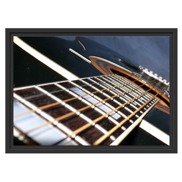 Gerahmtes Wandbild Gitarrensaiten East Urban Home Größe: 40 cm H x 55 cm B on Productcaster.