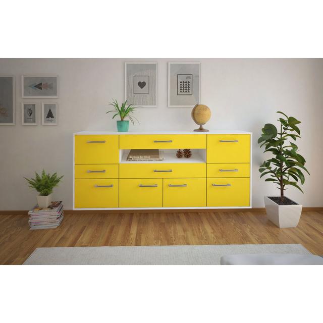 Sideboard Coral Springs Ebern Designs Farbe (Korpus/Front): Gelb/Weiß on Productcaster.