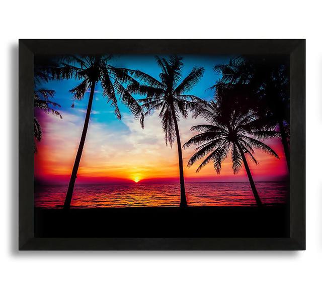 As The Sun Goes Down Between The Palm Trees Framed Print House of Hampton Format: Black Framed Canvas, Size: 100cm H x 141.4cm W x 3.3cm D on Productcaster.