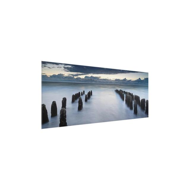 Wooden Stumps in the North Sea on Sylt - Photograph Print on Glass East Urban Home Size: 40 cm H x 100 cm W x 0.4cm D on Productcaster.