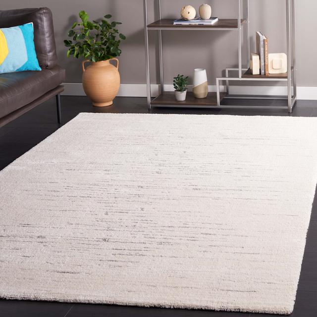 Allycia Machine Woven Ivory/Grey Rug Blue Elephant Rug Size: Rectangle 160 x 229cm on Productcaster.