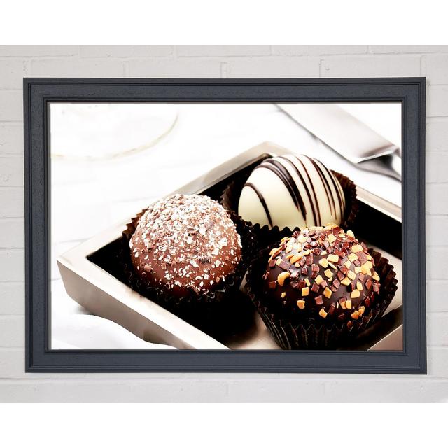 Trio of Chocolates - Einzelne Bilderrahmen Kunstdrucke Brayden Studio Größe: 84,1 cm H x 118,9 cm B x 1,5 cm T, Format: Poster mit grauem Rahmen on Productcaster.