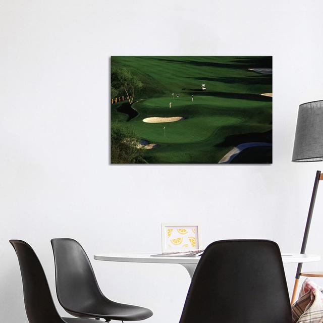 Golfer Putting On The Green by Panoramic Images - Wrapped Canvas Print Latitude Run Size: 66.04cm H x 101.6cm W x 1.905cm D on Productcaster.