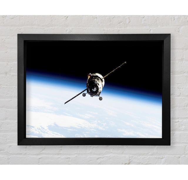 Orbiting The Earth - Print Brayden Studio Format: Black Framed Paper, Size: 100.1cm H x 141.4cm W x 3.4cm D on Productcaster.