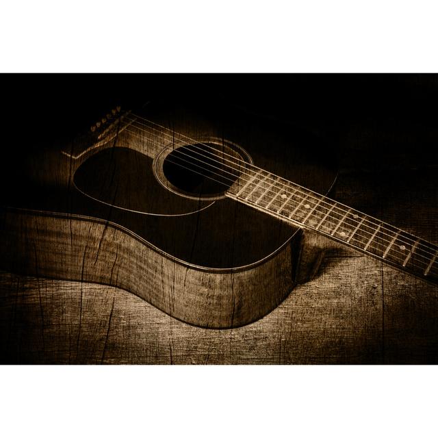 Guitar in Wood Texture by Tusumaru - Wrapped Canvas Photograph Marlow Home Co. Size: 30cm H x 46cm W on Productcaster.