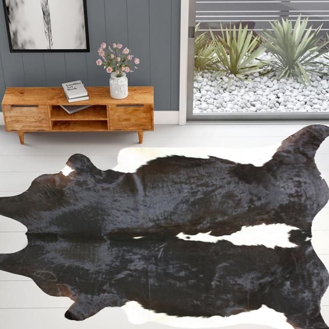 Spence Cowhide Black Rug Union Rustic on Productcaster.