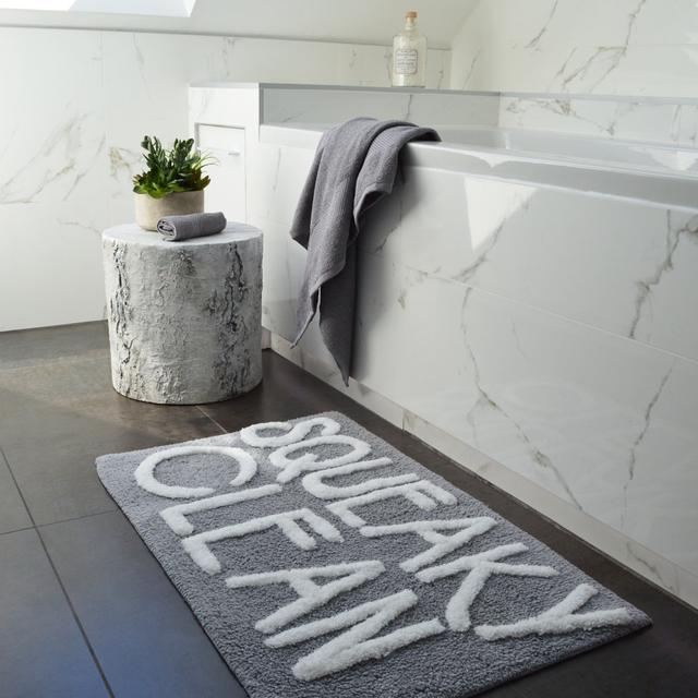 Erica Squeaky Clean Slogan Bath Mat Happy Larry on Productcaster.