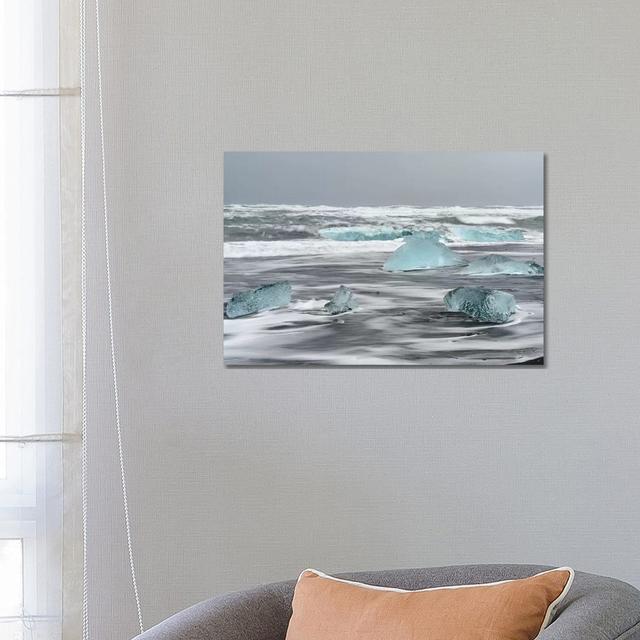 Icebergs On Black Volcanic Beach, Iceland. by Martin Zwick - Wrapped Canvas Print Latitude Run Size: 45.72cm H x 66.04cm W x 1.91cm D on Productcaster.