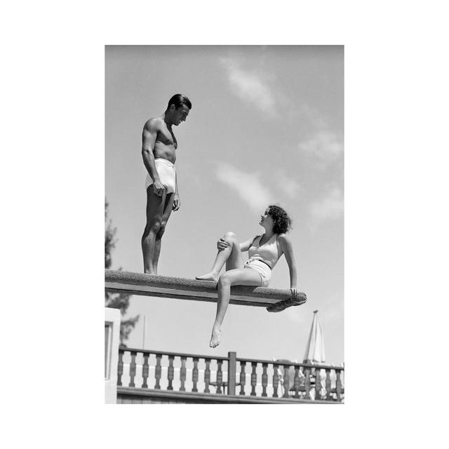 1930s Couple On Swimming Pool Diving Board Talking - Wrapped Canvas Print Latitude Run Size: 45.72cm H x 30.48cm W x 1.91cm D on Productcaster.