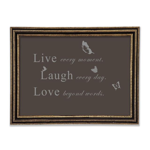 Love Quote Live Every Moment Lilac Gerahmter Druck Happy Larry Größe: 59,7 cm H x 84,1 cm B x 3 cm T, Farbe: Schokolade on Productcaster.