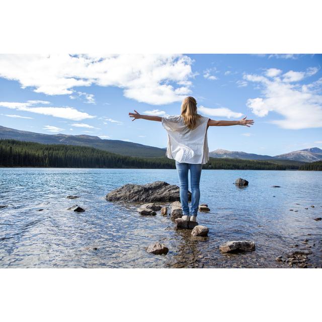 Woman Standing On Rock by Swissmediavision - No Frame Art Prints on Canvas Beachcrest Home Size: 30cm H x 46cm W on Productcaster.