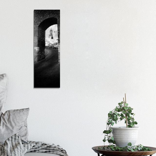 Church Viewed Through An Archway, Puerta Del Sol, Medina Sidonia, Cadiz, Andalusia, Spain - Wrapped Canvas Panoramic Print Ebern Designs Size: 91.44cm on Productcaster.