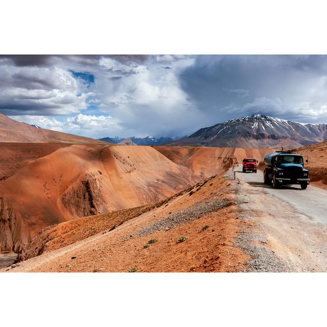 Blue And Red Truck On Cloudy Day by Pavliha - No Frame Art Prints on Canvas Alpen Home Size: 20cm H x 30cm W on Productcaster.