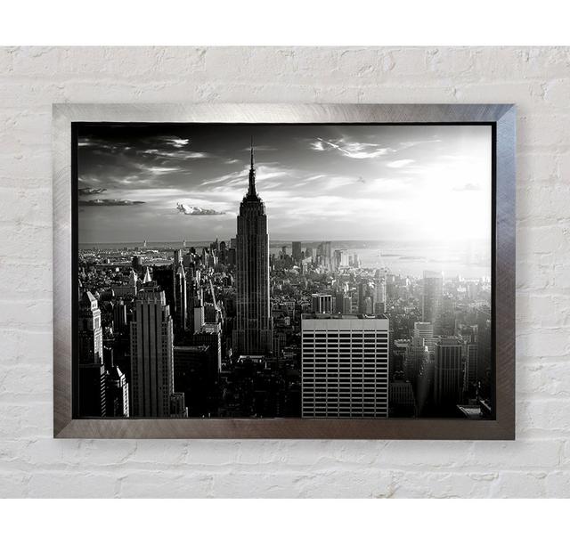 Empire State Building Sun Glow B N W Framed Print Ebern Designs Size: 84.1cm H x 118.9cm W x 3.4cm D, Format: Silver Framed Paper on Productcaster.