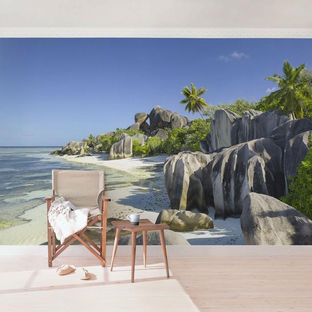 Dream Beach in the Seychelles Semi-Gloss Wallpaper Roll East Urban Home Size: 384cm x 255cm, Material quality: Standard (110g/m²) on Productcaster.