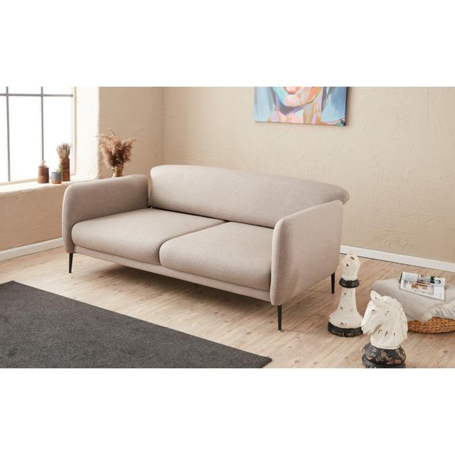 Sofa Sherron Corrigan Studio Polsterfarbe: Creme on Productcaster.