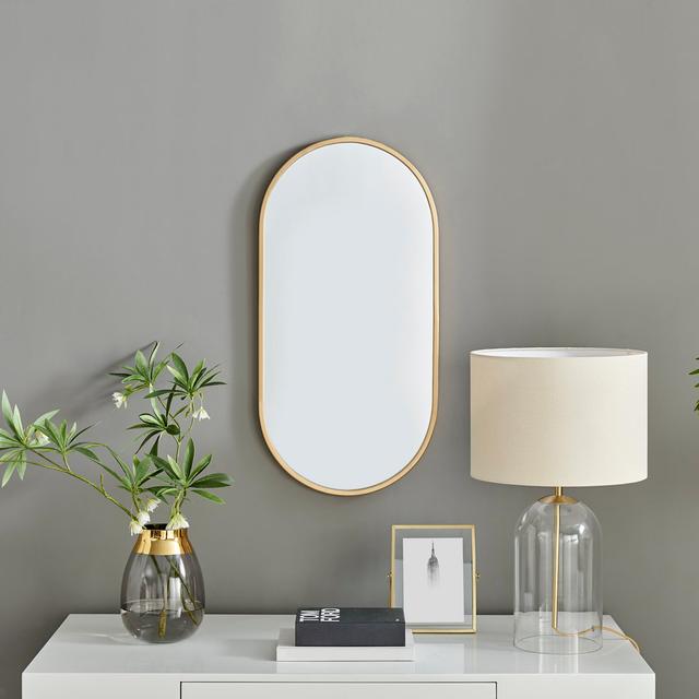 Roush Oval Shaped Metal Frame Mirror Simple Modern Design Canora Grey on Productcaster.