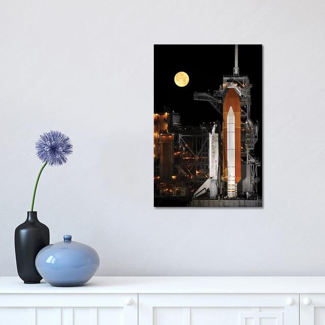 A Nearly Full Moon Sets As Space Shuttle Discovery Sits Atop The Launch Pad by Stocktrek Images - Wrapped Canvas Print Borough Wharf Size: 45.72cm H x on Productcaster.