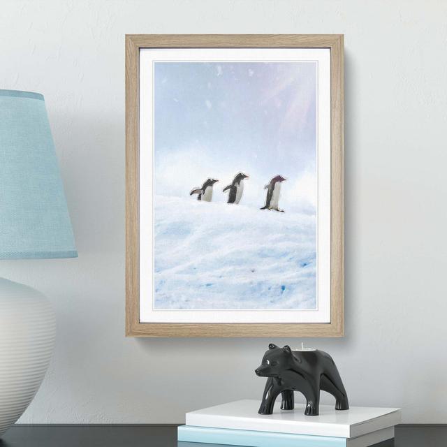 Three Penguins in the Antarctica - Picture Frame Graphic Art Print East Urban Home Frame Option: Oak, Size: 91cm H x 60cm W x 2cm D on Productcaster.