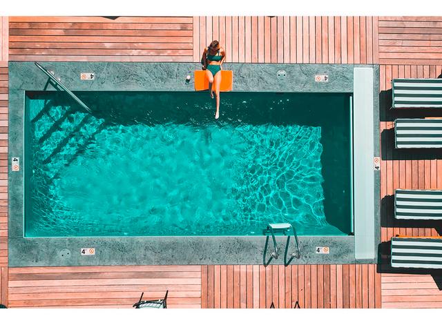 At The Pool - Print on Plastic / Acrylic Ebern Designs Size: 80cm H x 120cm W x 10cm D, Format: Black Frame on Productcaster.