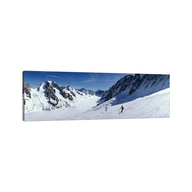 Rear View Of Two People Skiing, Les Grands Montets, Chamonix, France by Panoramic Images - Wrapped Canvas Panoramic Print Union Rustic Size: 30.48cm H on Productcaster.