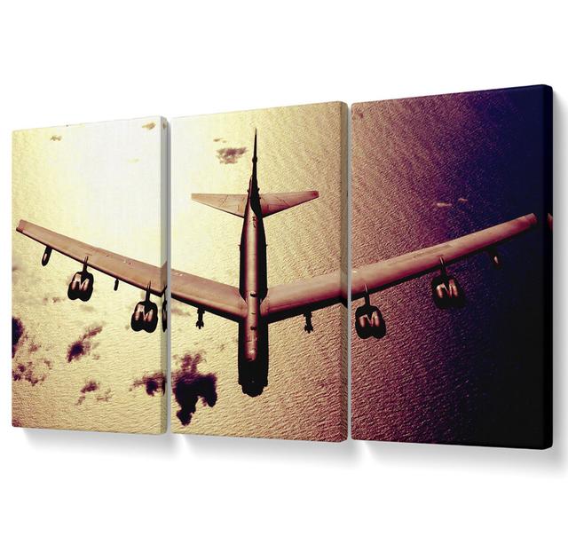 War Plane over the Ocean - 3 Piece Wrapped Canvas Graphic Art Brayden Studio Size: 81.3cm H x 163cm W on Productcaster.