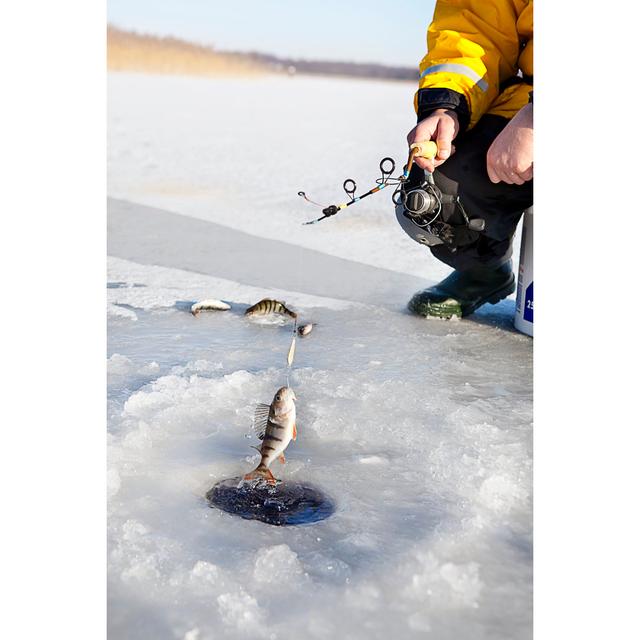 Ice Fishing - Wrapped Canvas Photograph Ebern Designs Size: 91cm H x 61cm W on Productcaster.