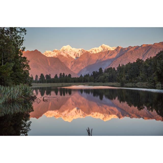 Scenic View Of Trees And Mountains Reflection In Lake Matheson Alpen Home Size: 61cm H x 91cm W on Productcaster.