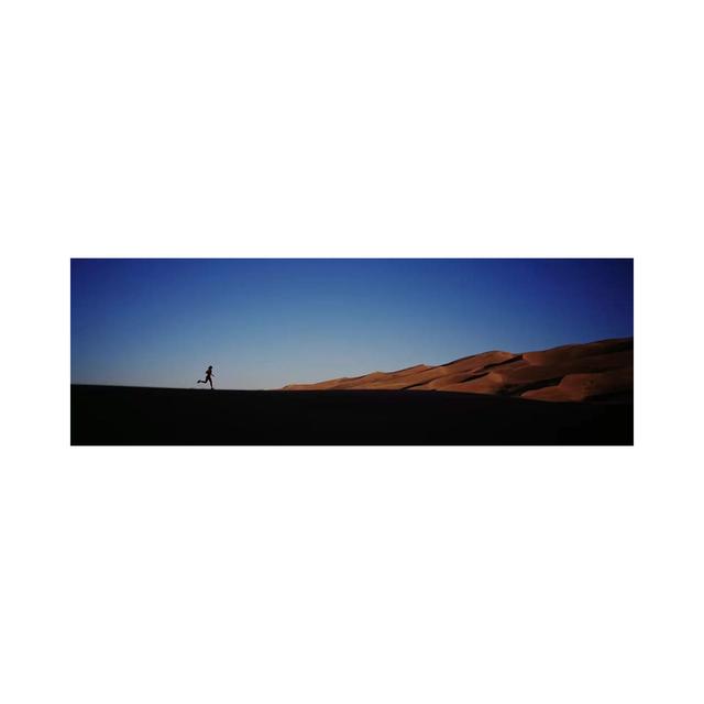 USA, Colorado, Great Sand Dunes National Monument, Runner Jogging In The Park - Wrapped Canvas Panoramic Print Union Rustic Size: 60.96cm H x 182.88cm on Productcaster.