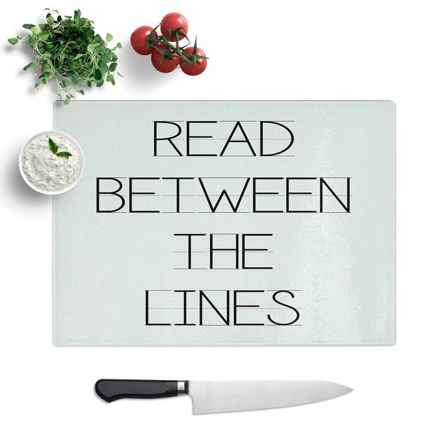 Read Between the Lines Typography Chopping Board East Urban Home Size: 0.4cm H x 20cm W x 28.5cm L on Productcaster.