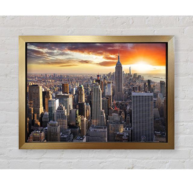 City In The Sun Rise Skyscrapers - Print Brayden Studio Size: 100cm H x 141.4cm W x 3.4cm D, Format: Gold Framed Paper on Productcaster.