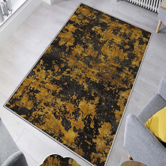 Teppich Campanelli in Schwarz/Gold Williston Forge Teppichmaße: Rechteckig 100 cm x 150 cm on Productcaster.